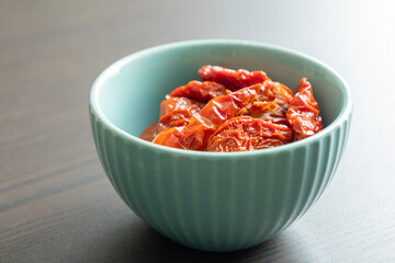 Sun-Dried Tomatoes in Small Blue Bowl