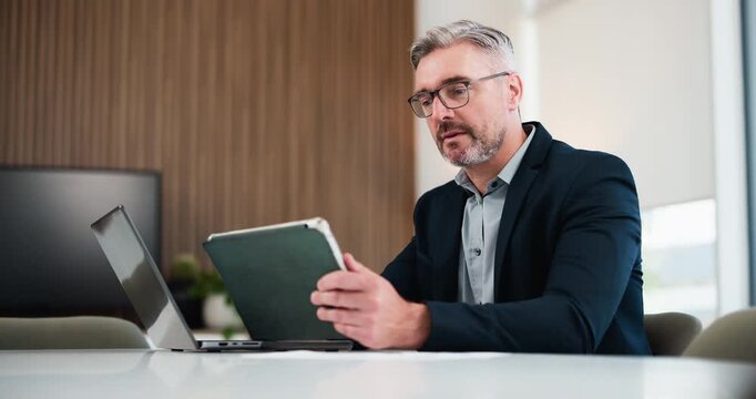 Thinking, tablet and business man in office for finance report, research and investment. Corporate, professional and mature person on digital tech for financial review, proposal and budget planning