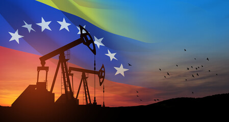 The change in oil prices. Oil price cap concept. Oil drilling derricks at desert oilfield with Venezuela flag. Crude oil production from the ground. Petroleum production.