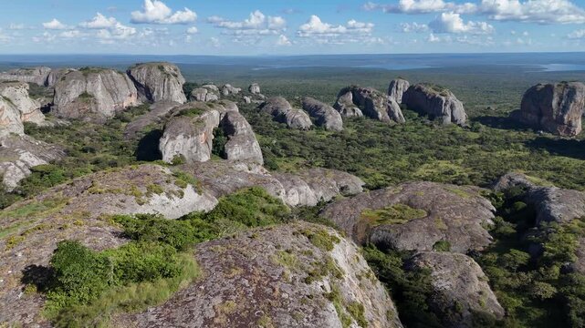 Cinematic aerial vista of the expansive Pedras Negras de Pungo Andongo rock field in the Malanje Province, Angola, Africa
