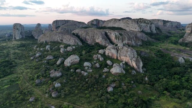 Cinematic sunset aerial view of the Pungo Andongo Black Rocks in Malanje, Angola