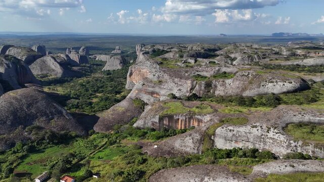 Stunning aerial panorama over the vast field of Pedras Negras de Pungo Andongo monoliths in the Malanje Province, Angola, Africa, under a clear blue sky