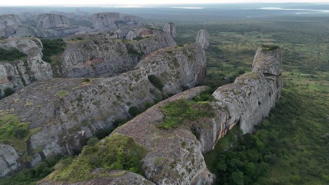 Panoramic drone view of the historic Pedras Negras rock system in Pungo Andongo, Malanje Province, Angola, Southern Africa, during the golden hour