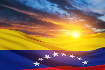 Fototapeta premium Venezuela flag on background of sunset sky. Patriotic concept. Banner with place for text.
