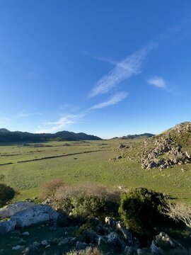 Tetouan, Morocco Scenic forest road near Fahs El Maher Mountain, surrounded by mountains and a calm natural atmosphere