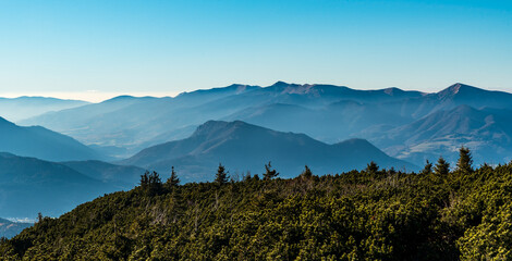 Low Tatras mountains from Velky Choc hill in Chocske vrchy mountains in Slovakia