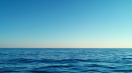 Obraz premium Calm ocean waves at dusk serene seascape nature photography tranquil water environment wide-angle view coastal beauty for relaxation