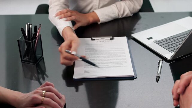 Family Signing Loan Document