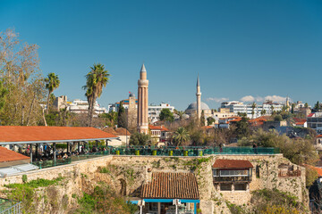 Obraz premium Historic Antalya Old Town skyline with Yivli Minaret and clock tower