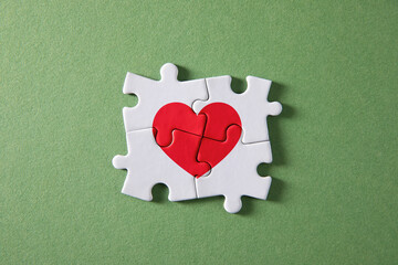 red heart with puzzle