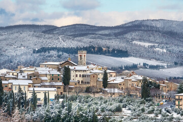 Naklejka premium Winter Panorama of Radda in Chianti Covered in Snow, Tuscany, Italy