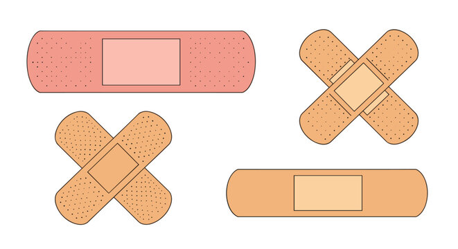 Collection of different adhesive medical bandages and band-aids in various shapes for first aid and wound care.