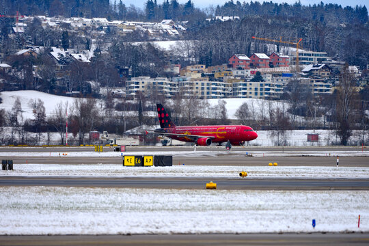 Brussels Airlines Airbus A320-214 OO-SNO Red Devils and Red Flames Livery taxiing on a winter day at Swiss Z&uuml;rich Airport. Photo taken January 12th, 2026, Zurich, Switzerland.