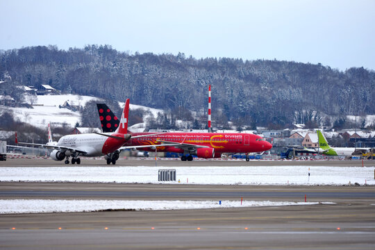 Brussels Airlines Airbus A320-214 OO-SNO Red Devils and Red Flames Livery taxiing on a winter day at Swiss Z&uuml;rich Airport. Photo taken January 12th, 2026, Zurich, Switzerland.