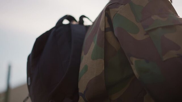 Detailed View Of Tactical Gear, Close Inspection Of Military Equipment And Apparel, An Immersive High Resolution Perspective Showcasing Specialized Military Backpacks And Protective Jackets