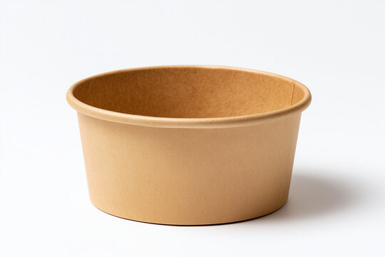 Empty kraft paper bowl with smooth texture and natural brown color. Eco friendly disposable food container for takeaway and packaging, clean studio lighting, isolated on white background.
