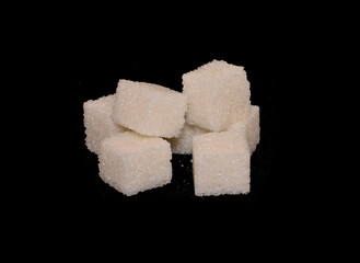 sugar isolated on black background