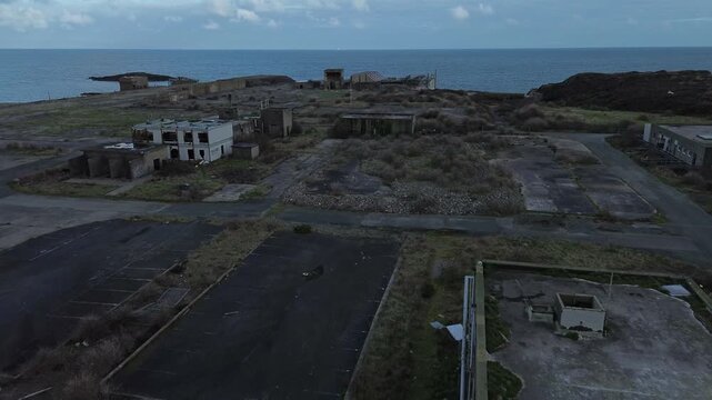 Disused Octel chemical facility aerial view over decayed industrial factory offices and wasteland
