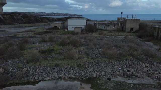 Desolate Octel chemical facility aerial view abandoned industrial factory offices and wasteland