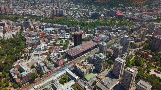 Drone fly Santiago de Chile Cityscape with Traffic at GAM Cultural Center and Lastarria Neighborhood