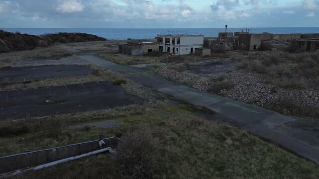 Deserted Octel chemical facility aerial view abandoned industrial concrete offices and wasteland