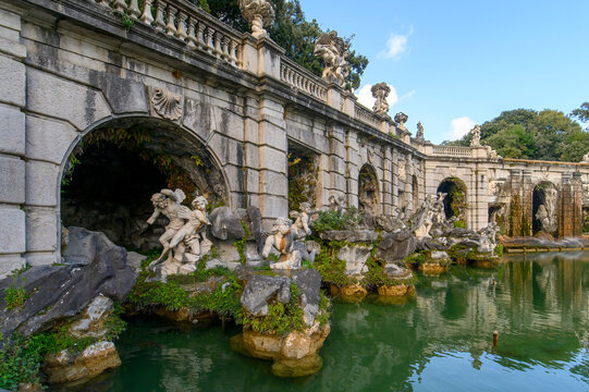 The Fountain of Aeolus in the Royal Park of Caserta with baroque sculptures and arches, Italy