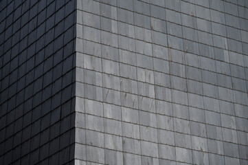 The roof is covered with slate tiles.