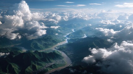 Breathtaking Aerial View of Lush Green Mountains and River Flowing Through Clouds in Scenic Landscape
