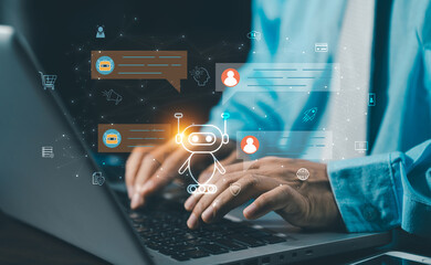Businessman working on laptop with virtual AI chatbot assistant for business communication. Concept of automated support and smart office technology.