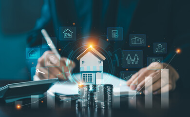 Businessman hand holding house model with coins stack and financial growth graph. Concept of real estate investment, home loan, and property insurance
