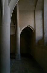 Interior of medieval castle in suggestive lighting. Renaissance architecture detail.