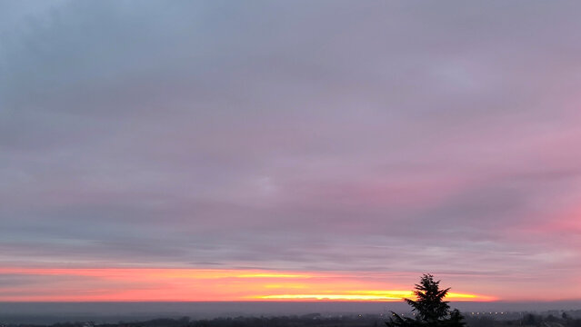colorful sky at sunrise above the Srem district