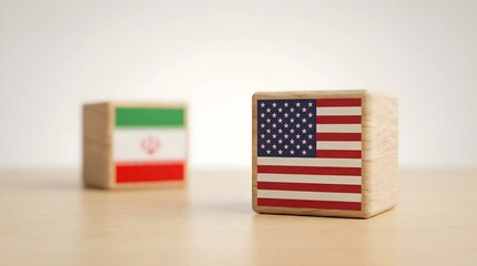 us and iran flags on wooden blocks