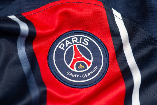 Kyiv, Ukraine. January 13, 2026. Close-up of Paris Saint-Germain football club crest embroidered on red and blue jersey fabric, symbol of French soccer identity and sport culture.