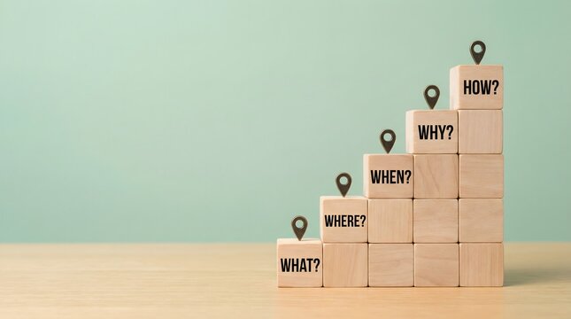 Wooden blocks with question marks on a table