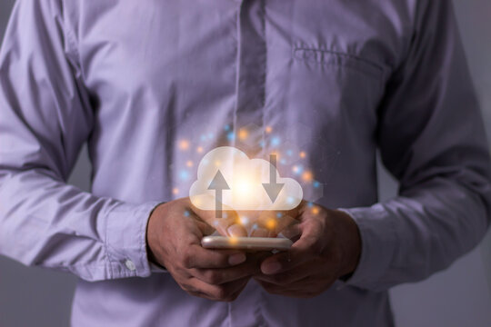 Young man with smartphone mobile hand touching to cloud computing diagram, Data storage, Cloud technology, Cloud Computing Storage - Powered by Adobe