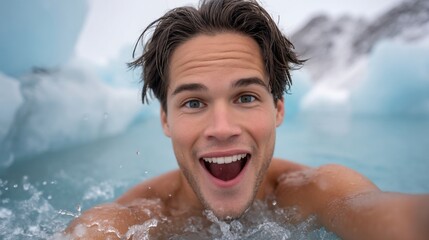 Man swimming in icy water with a big smile.