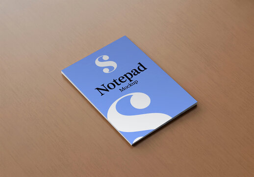 Notepad Mockup on Wooden Desk