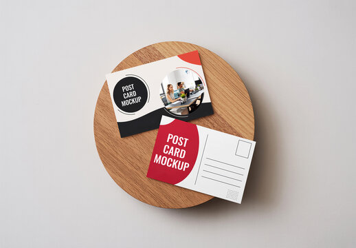 Postcard Mockup on Round Wooden Slab