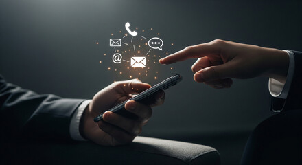 Hands using a smartphone with glowing communication icons symbolizing connectivity and digital interaction.