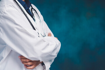 Confident doctor with crossed arm medical concept.