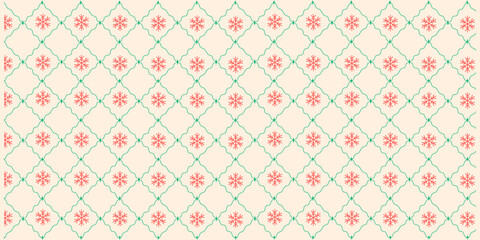 Fototapeta premium Winter snowflake ornament seamless pattern in green and red tones