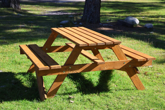 Wooden table with wooden chairs.
