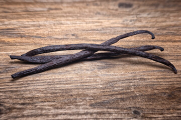 Obraz premium Vanilla pods (Vanilla planifolia), Orchidaceae. Pastry ingredients, spices.