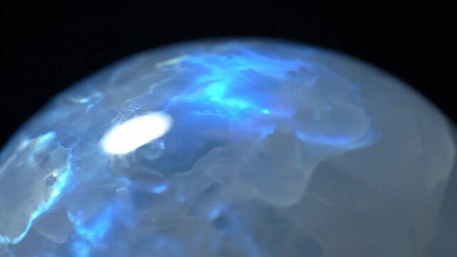A Glowing Moonstone Shifting With Lunar Phases