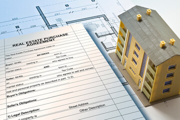 REAL ESTATE PURCHASE AGREEMENT CONCEPT with condominium residential building model and approved residential building project