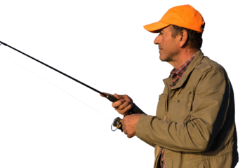 Fishing rod wheel closeup, man fishing with a beautiful sunset.