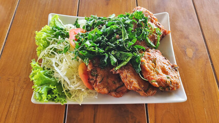 The image depicts snakehead fish, a popular dish among Thai people and tourists visiting Asia.