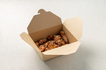Fried chicken bites in paper box