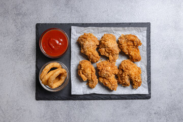 Fried Chicken Wings On Stone Board